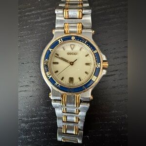 Gucci Men's Silver and Gold Watch with Blue Accent
